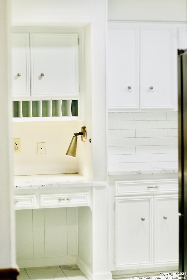 bathroom with tasteful backsplash