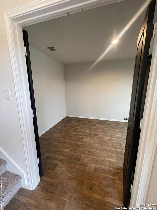 hall featuring dark hardwood / wood-style floors