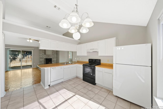 kitchen with white cabinetry, light tile patterned flooring, white appliances, and sink