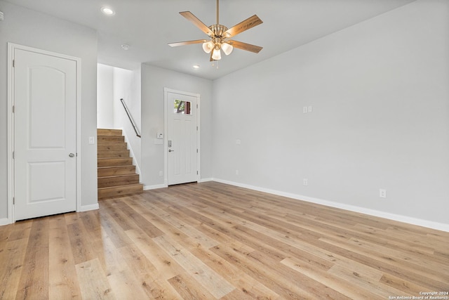 foyer featuring light hardwood / wood-style floors and ceiling fan