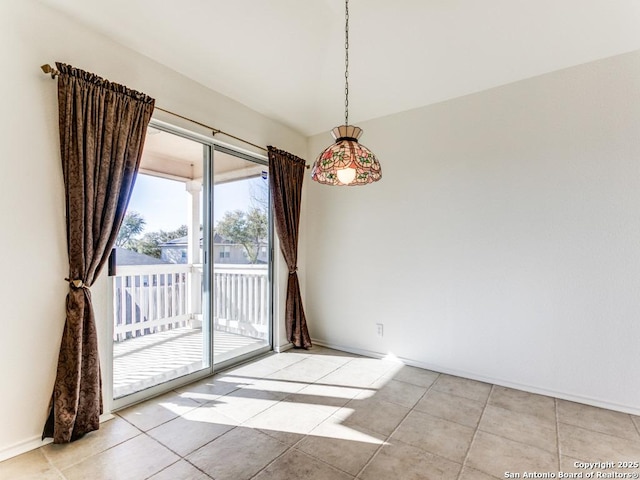 unfurnished dining area with light tile patterned floors