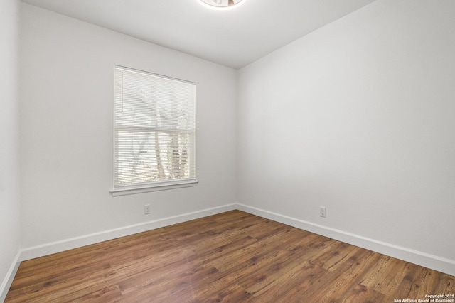 unfurnished room featuring wood-type flooring