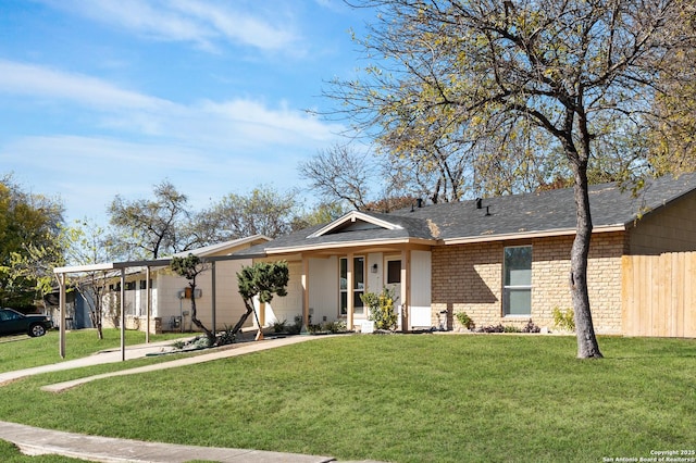 ranch-style house with a front lawn