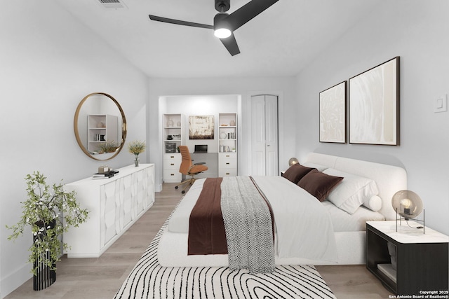 bedroom featuring light hardwood / wood-style floors and ceiling fan