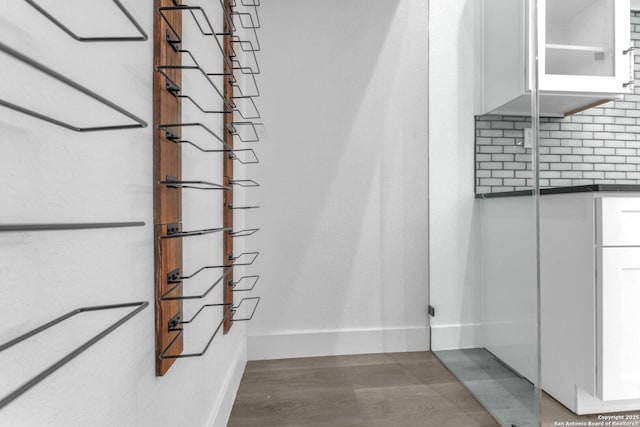 stairway featuring hardwood / wood-style floors