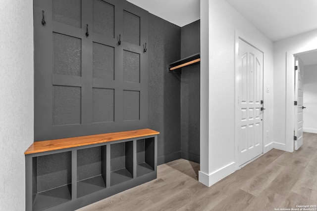 mudroom with light wood-type flooring