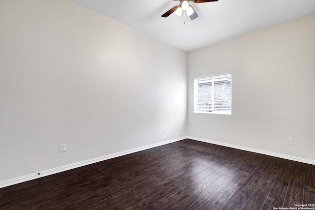 empty room featuring hardwood / wood-style flooring and ceiling fan