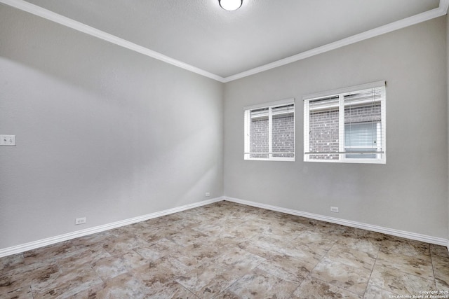 unfurnished room with crown molding