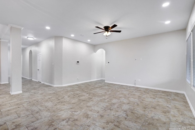 unfurnished room with ceiling fan