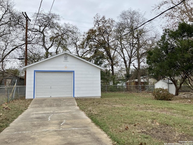 garage with a lawn