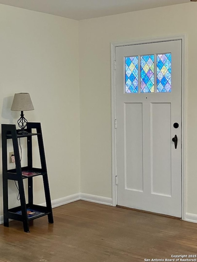 entrance foyer with hardwood / wood-style floors