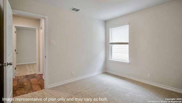 empty room with carpet floors