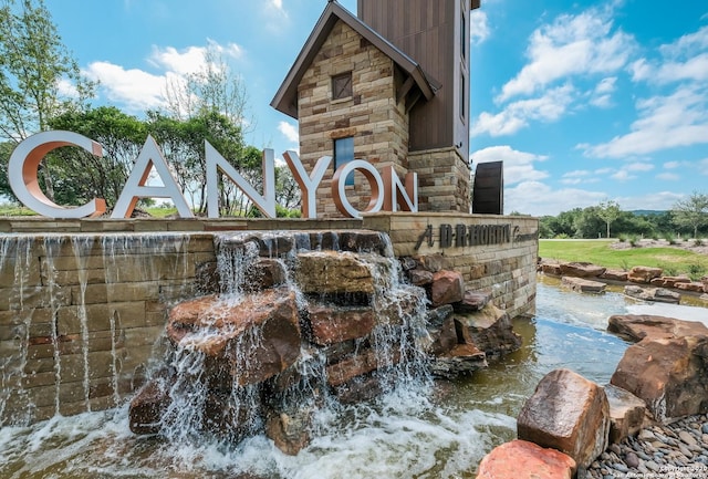 view of community sign