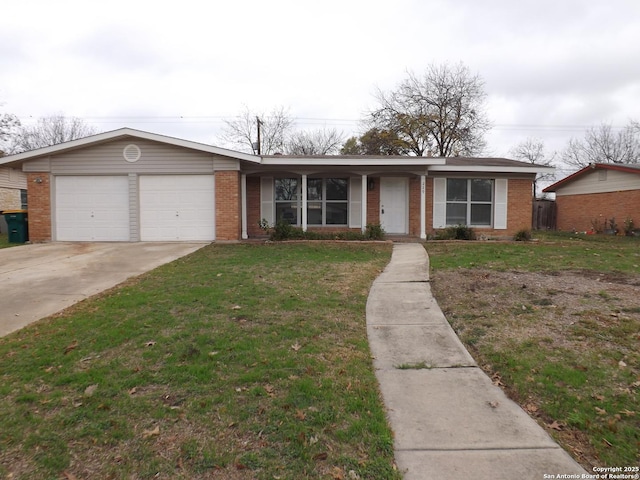 ranch-style house with a garage and a front lawn