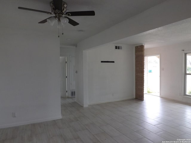 empty room featuring ceiling fan