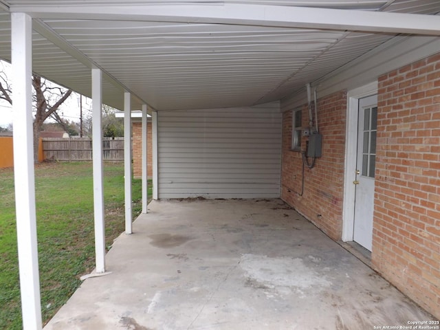 view of patio / terrace featuring a carport