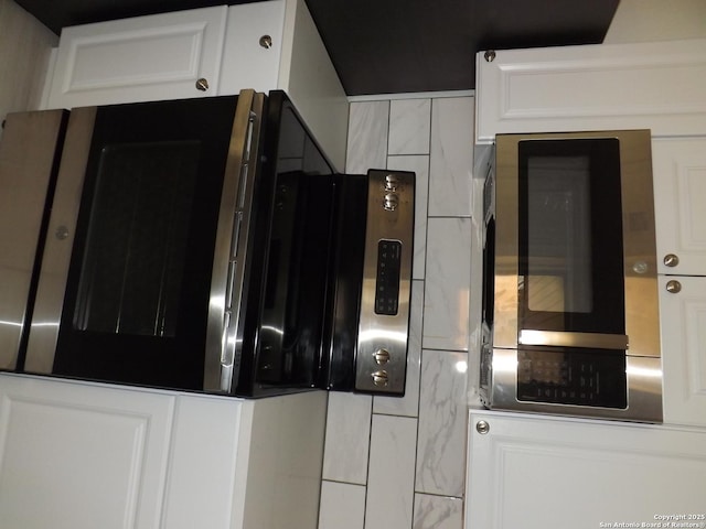 kitchen with white cabinets