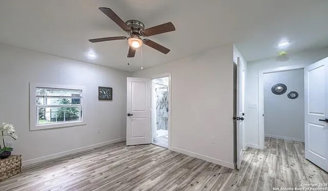 interior space featuring ceiling fan and light hardwood / wood-style flooring