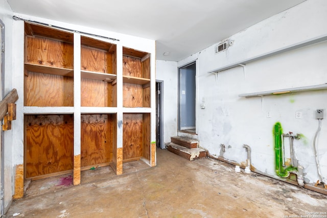 interior space featuring concrete floors