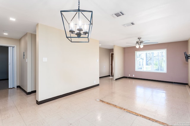 unfurnished room featuring ceiling fan with notable chandelier