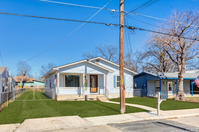 bungalow-style home with a porch and a front lawn