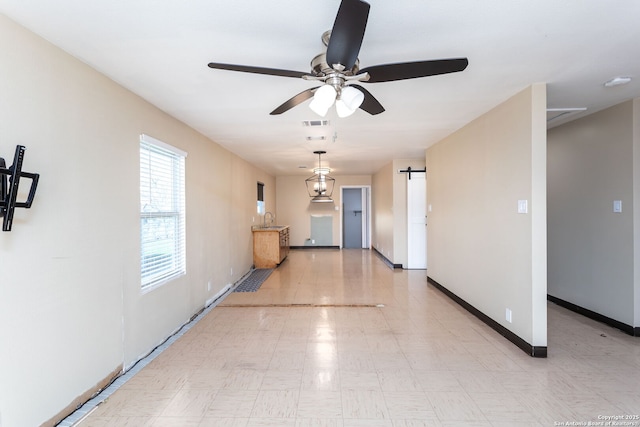 interior space featuring ceiling fan