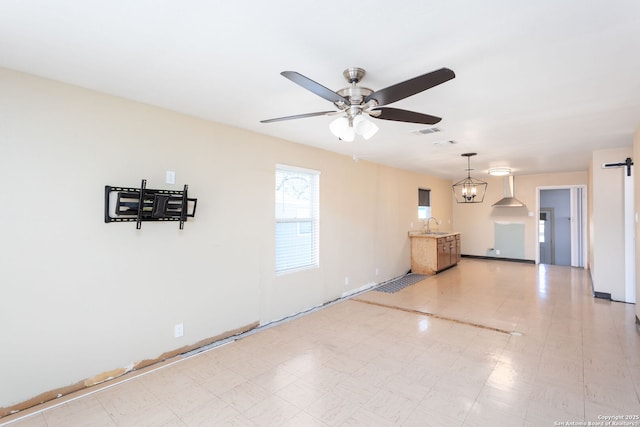 living room featuring sink and ceiling fan