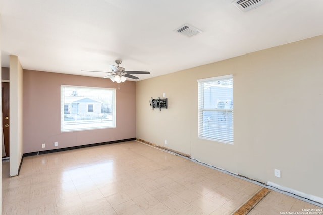 empty room with ceiling fan