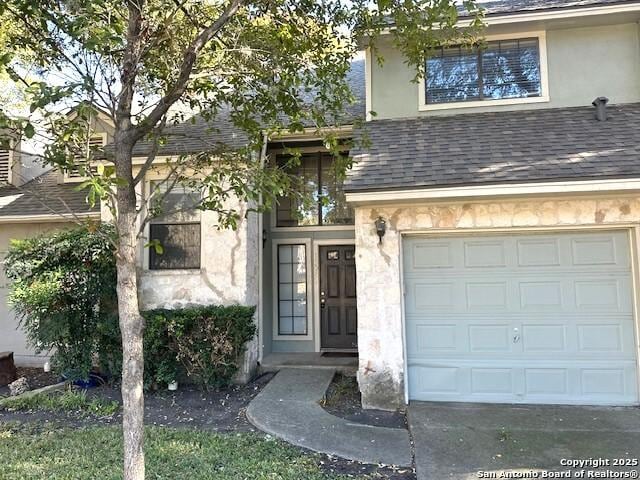 view of front of home with a garage