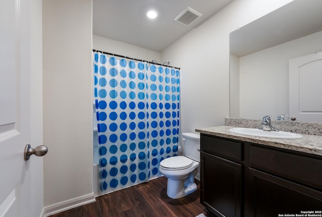 full bathroom with wood-type flooring, vanity, toilet, and shower / bath combo