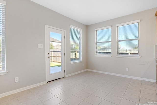 view of tiled spare room