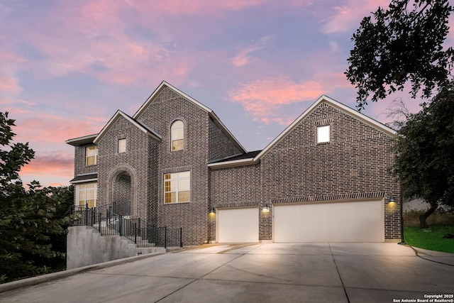 view of front of property with a garage