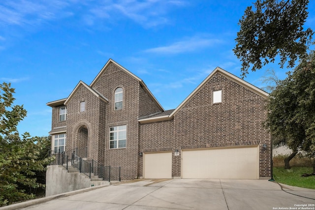 front facade with a garage