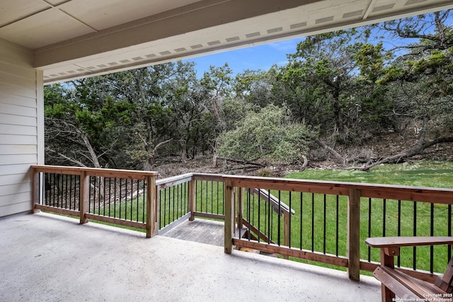 wooden deck with a yard