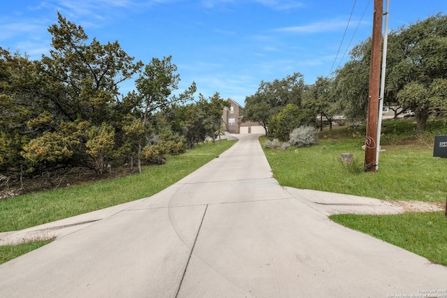 surrounding community featuring a yard