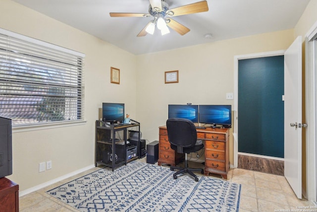 tiled home office with ceiling fan