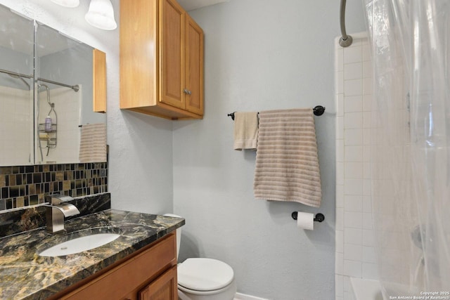 full bathroom with decorative backsplash, toilet, shower / bath combo, and vanity