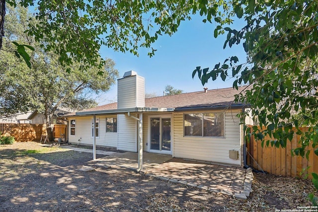 back of property featuring a patio