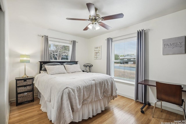 bedroom featuring ceiling fan and light wood-type flooring