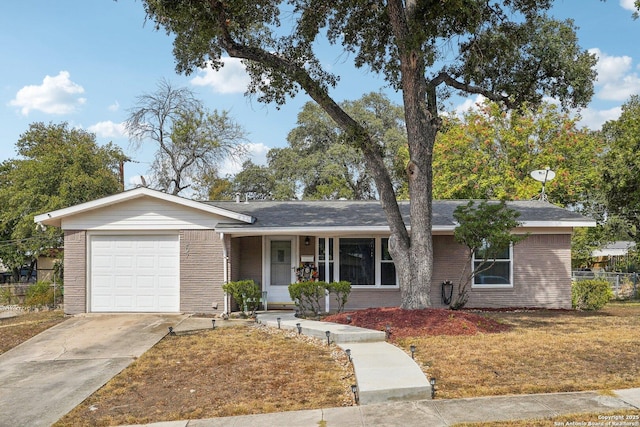 single story home featuring a garage