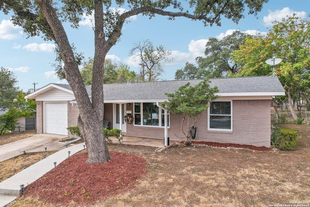 single story home with a garage