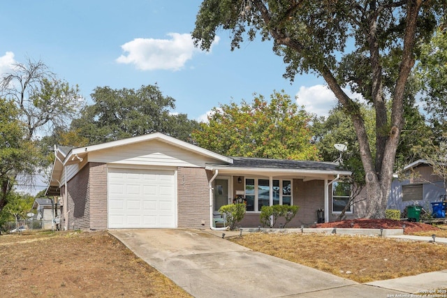 ranch-style home featuring a garage