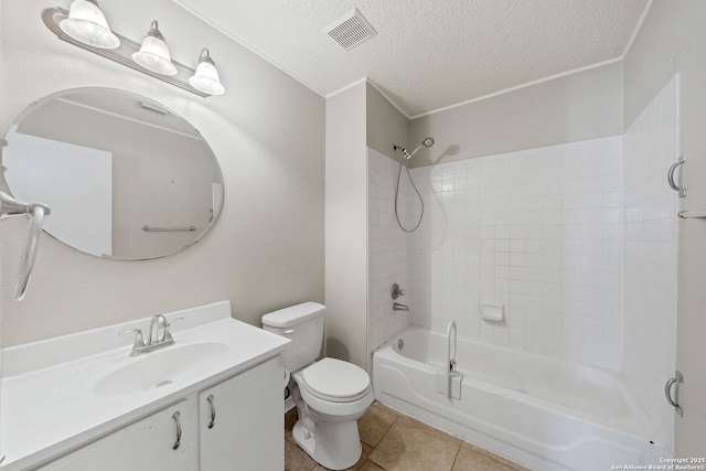 full bathroom featuring vanity, bathing tub / shower combination, tile patterned flooring, toilet, and a textured ceiling