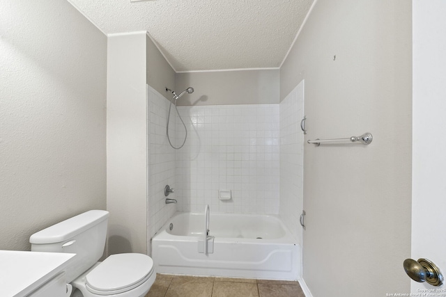 full bathroom with tub / shower combination, vanity, a textured ceiling, tile patterned flooring, and toilet