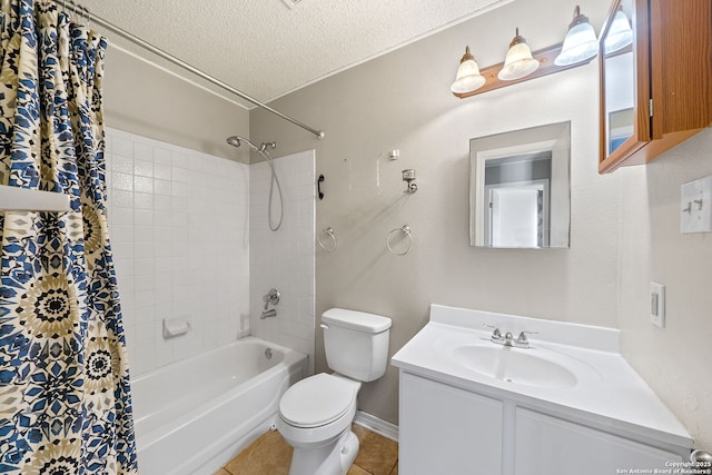 full bathroom with vanity, tile patterned flooring, toilet, a textured ceiling, and shower / tub combo