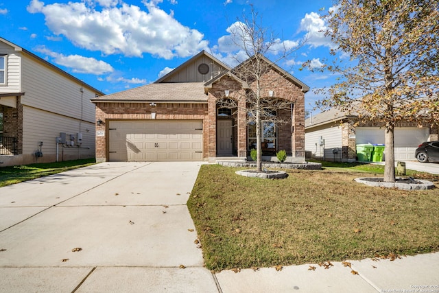 view of front of property featuring a garage and a front yard