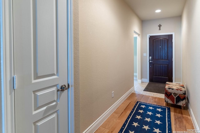 doorway featuring hardwood / wood-style floors