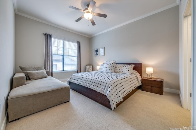 bedroom featuring ornamental molding, ceiling fan, and carpet flooring