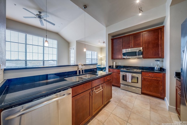 kitchen with sink, light tile patterned floors, pendant lighting, ceiling fan, and stainless steel appliances