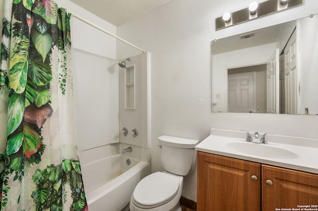 full bathroom featuring vanity, a textured ceiling, toilet, and shower / bath combo with shower curtain